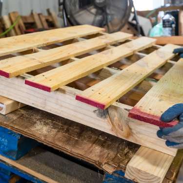 Is It Better To Repair or Replace Wooden Pallets?